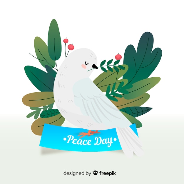Vecteur gratuit composition de jour de paix avec colombe blanche et plate