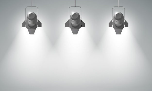 Vecteur gratuit composition de projecteurs suspendus réalistes avec trois faisceaux lumineux