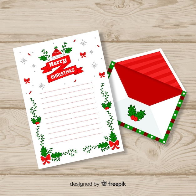 Vecteur gratuit concept d'enveloppe et lettre de noël dessinés à la main