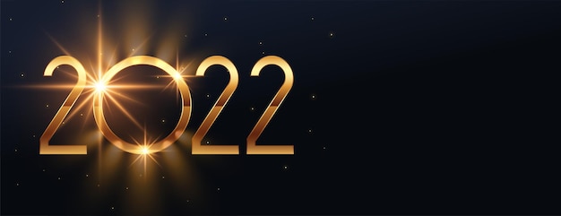 Conception de bannière de célébration étincelante du nouvel an doré 2022