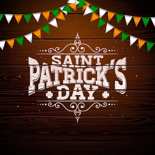 Conception de la Saint-Patrick avec drapeau de couleur nationale et lettre de typographie sur fond de bois vintage.