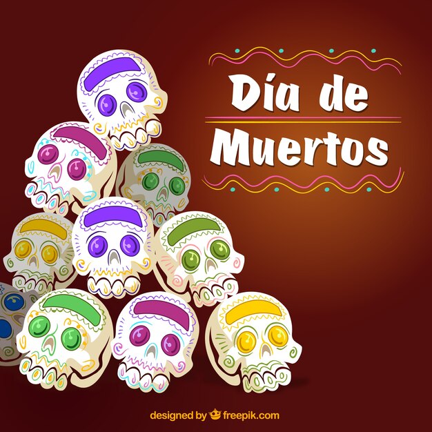 Contexte de la journée des morts avec des crânes mexicains dessinés à la main