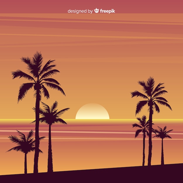 Coucher de soleil sur la plage avec des silhouettes de palmiers