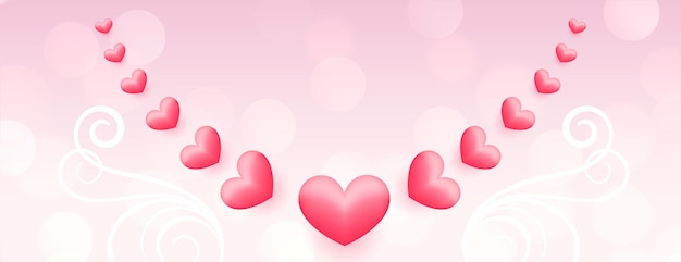 Décoration coeurs avec fleurs sur bannière rose