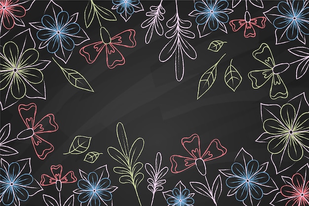 Vecteur gratuit doodles de fleurs sur fond de tableau noir