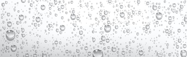 L'eau de condensation tombe. Gouttelettes de pluie avec réflexion de la lumière