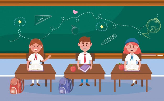 Des élèves filles et garçons au bureau avec un livre et une pomme pour la rentrée scolaire