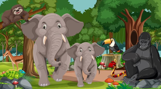 Famille d'éléphants avec d'autres animaux sauvages dans la scène forestière