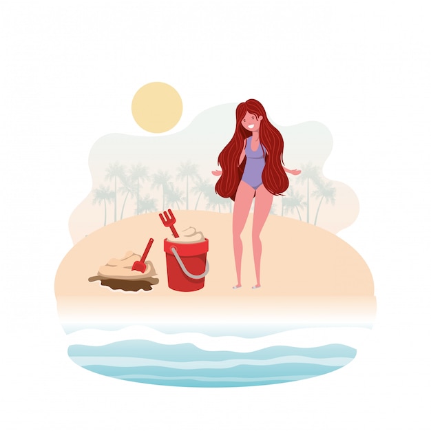 Femme au bord de la plage avec un seau de sable