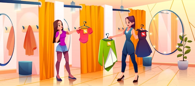 Femme en cabine d'essayage essaie des vêtements en magasin