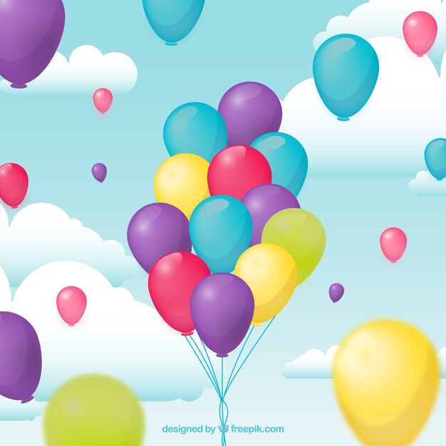 Fond de ballons colorés avec des nuages ​​dans le ciel