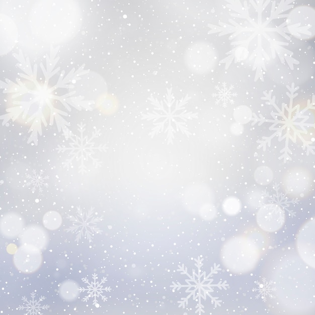 Fond de Noël blanc avec bokeh et flocons de neige