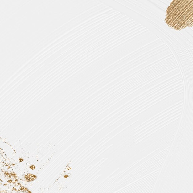Fond texturé de peinture au pinceau blanc avec des paillettes d'or