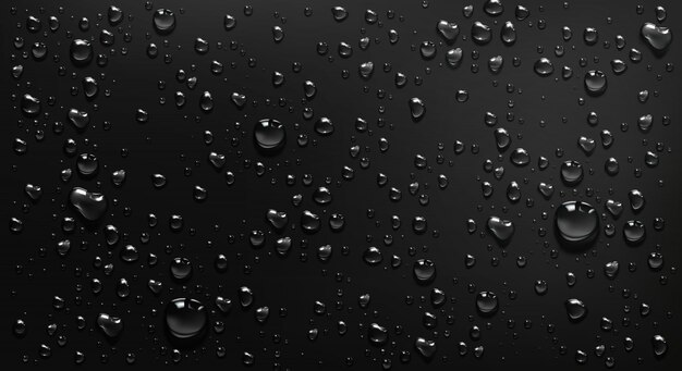 Gouttes d'eau de condensation sur fond de verre noir