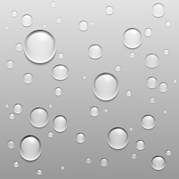 Gouttes d'eau sur une surface grise
