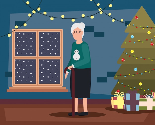 Grand-mère Dans Le Salon Avec Décoration De Noël