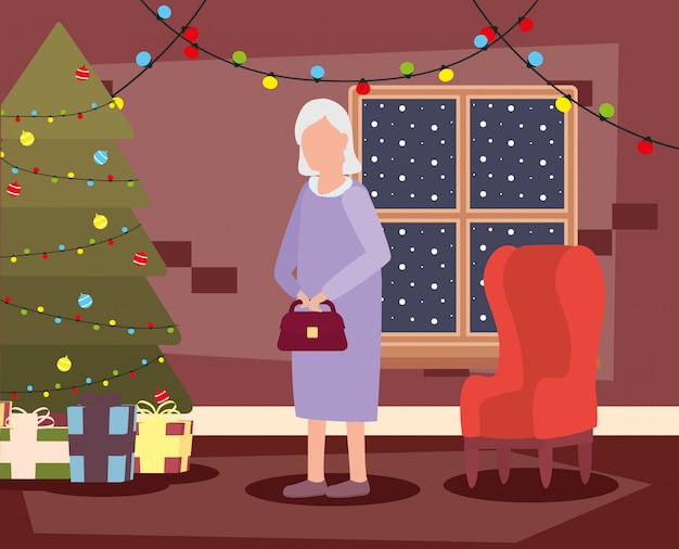 Grand-mère Dans Le Salon Avec Décoration De Noël