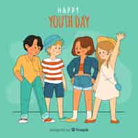 Vecteur gratuit groupe d'enfants sur style dessiné à la main pour célébrer la journée de la jeunesse sur fond vert clair