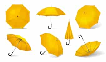 Vecteur gratuit l'icône de parapluie jaune isolée et réaliste définit sept emplacements différents de l'illustration de parapluie jaune