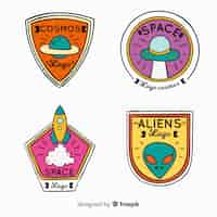 Vecteur gratuit insigne de l'espace coloré dessiné à la main collectio