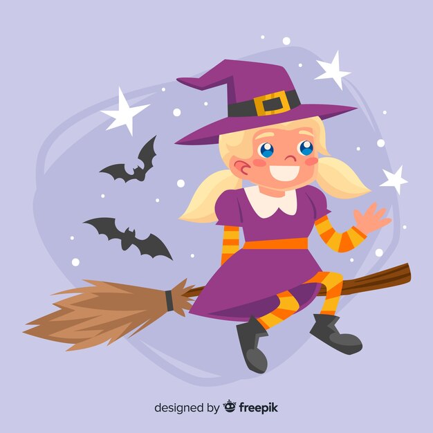 Jolie sorcière d'halloween sur un balai