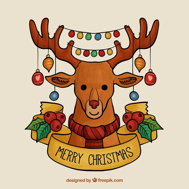 Joyeux Noël dessiné à la main avec des renne et des guirlandes