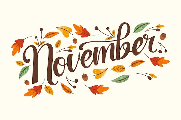 Lettrage à la main de novembre avec des feuilles d'automne décoration dessinée à la main
