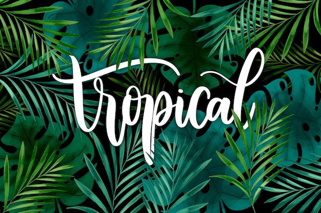 Lettrage tropical avec des feuilles ou des fleurs