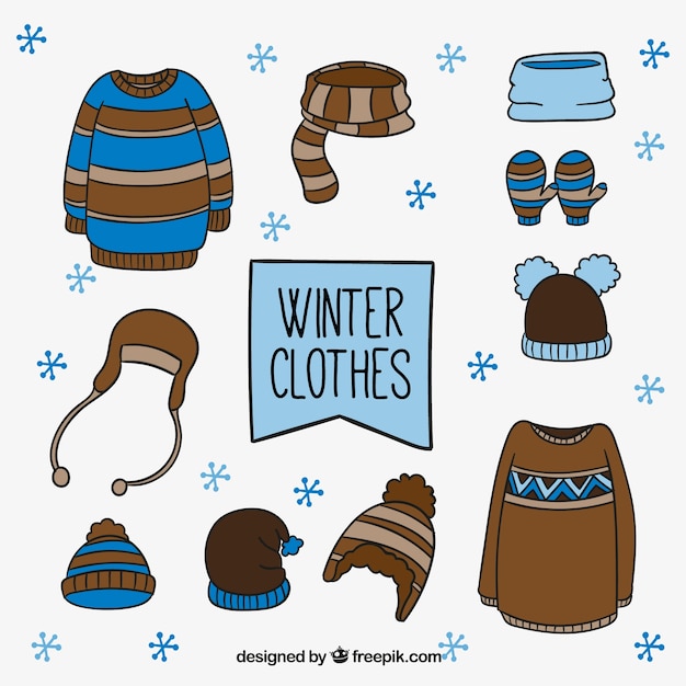 Vecteur gratuit lot de vêtements d'hiver avec des éléments dessinés à la main