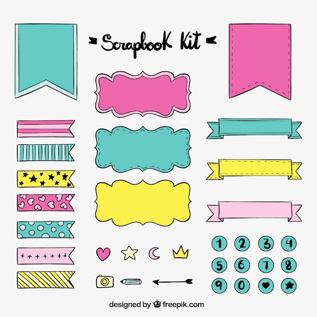 Main Kit De Scrapbook Dessiné Avec Des Rubans Et Des Autocollants