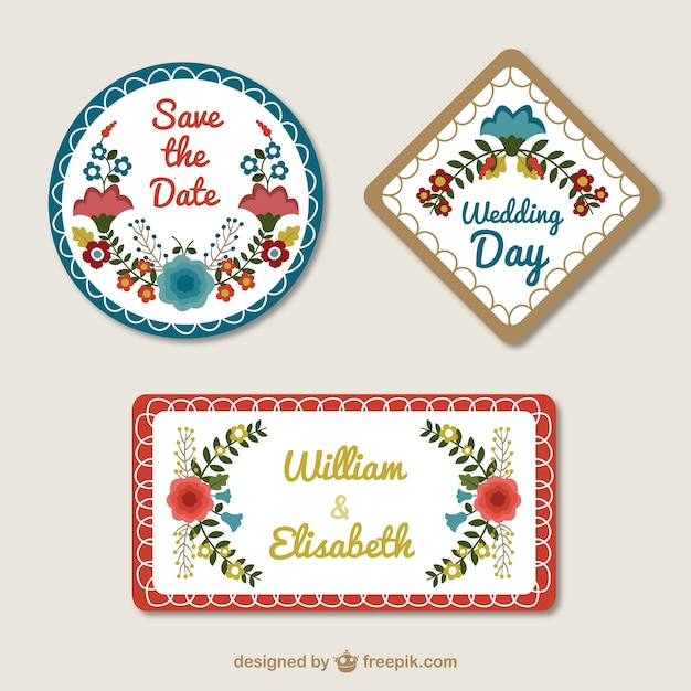 Vecteur gratuit main mignonne dessinée badges de mariage floral