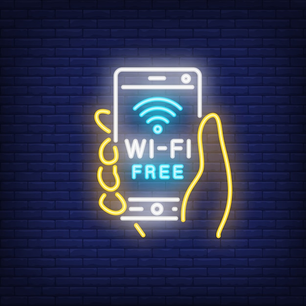Vecteur gratuit main tenant un smartphone avec texte néon gratuit wi-fi