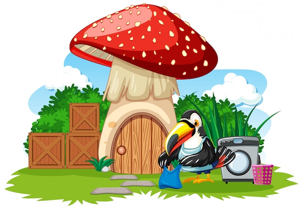 Vecteur gratuit maison aux champignons avec un style mignon de bande dessinée d'oiseau sur fond blanc