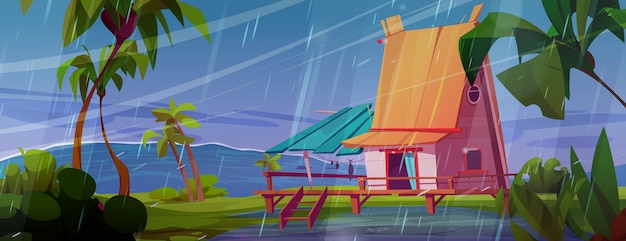 Vecteur gratuit maison de pêcheur au bord de la mer dans un temps orageux illustration de dessin animé vectoriel d'un paysage tropical avec une hutte délabrée sur la plage inondée d'eau pluie forte vent pliant des palmiers ciel nuageux