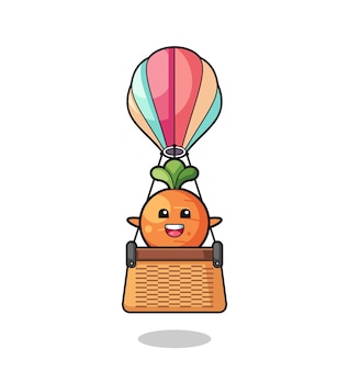 Mascotte de carotte chevauchant une montgolfière