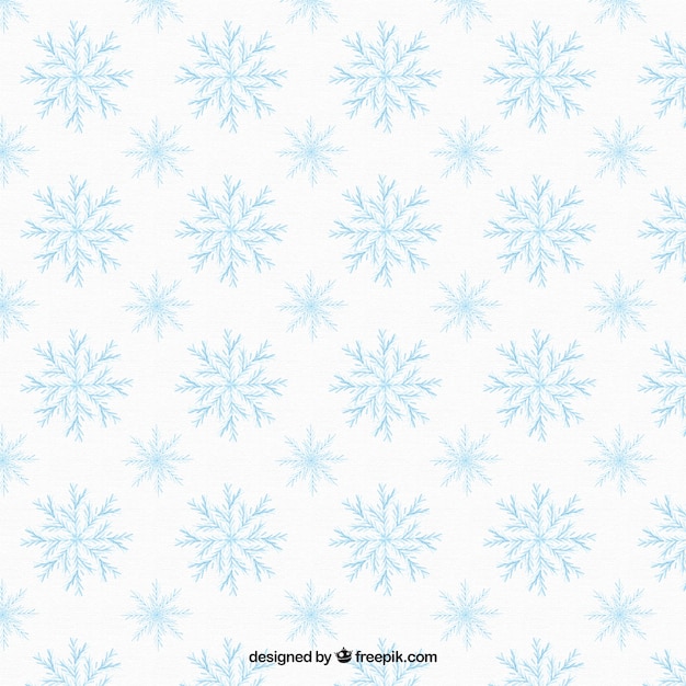 Vecteur gratuit motif dessiné à la main avec des flocons de neige bleus