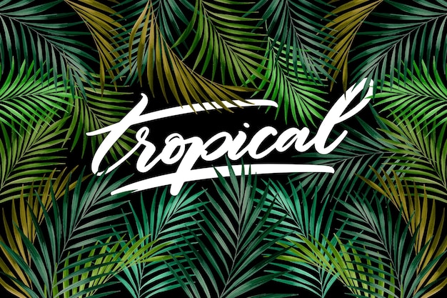 Vecteur gratuit motif de feuilles tropicales lettrage