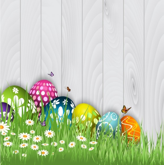 Vecteur gratuit oeufs de pâques avec des papillons fond