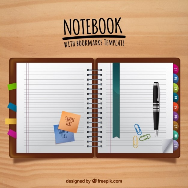 ordinateur portable plat avec des signets et un stylo avec post-its