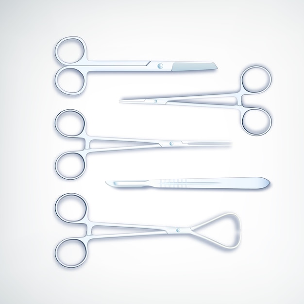 Outils médicaux réalistes sertis de ciseaux métalliques scalpel et pinces sur blanc isolé