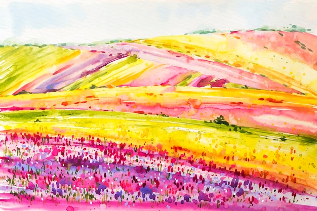 Paysage de printemps aquarelle avec des champs de fleurs colorées