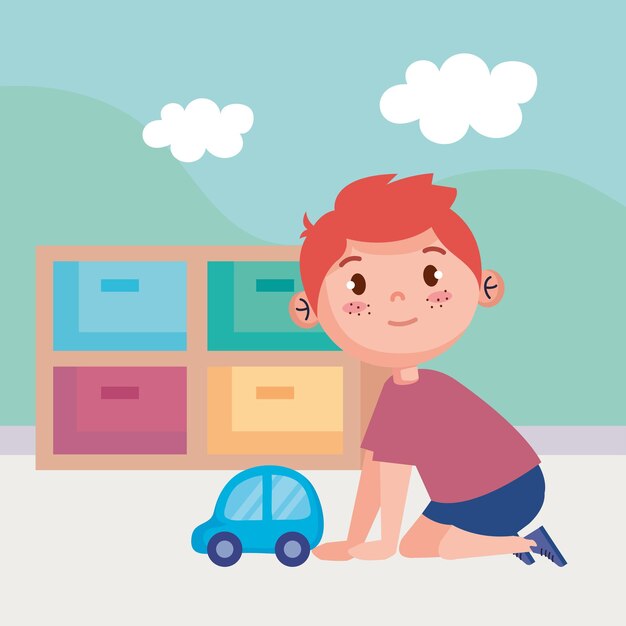 petit garçon jouant avec un personnage de voiture