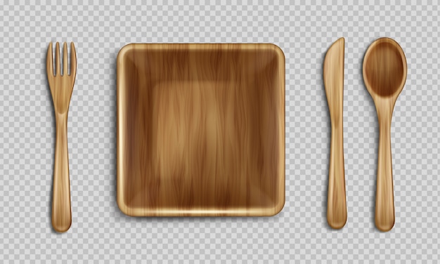 Plaque en bois, fourchette, cuillère et couteau vue de dessus.