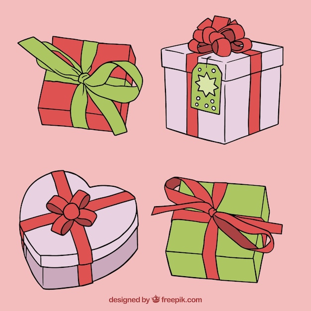 Vecteur gratuit quatre cadeaux de noël dessinés à la main