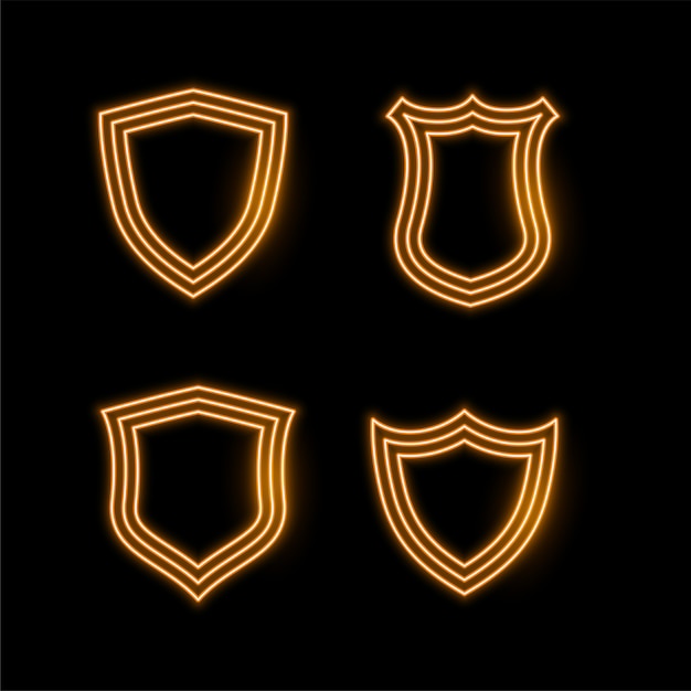 Quatre icônes de bouclier de néon d&#39;or