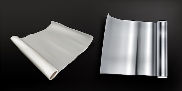 Rouleaux de papier d'aluminium et papier sulfurisé isolés