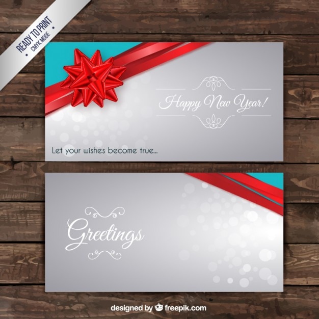 Vecteur gratuit salutation nouvelle carte de l&#39;année