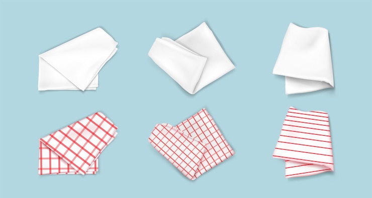 Vecteur gratuit des serviettes de cuisine à rayures à carreaux blanches pliées