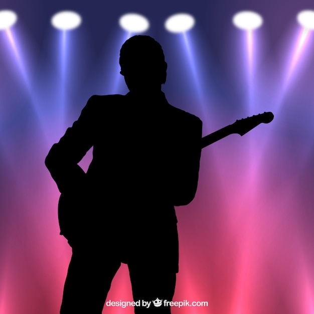 Vecteur gratuit silhouette du guitariste rétro-éclairée