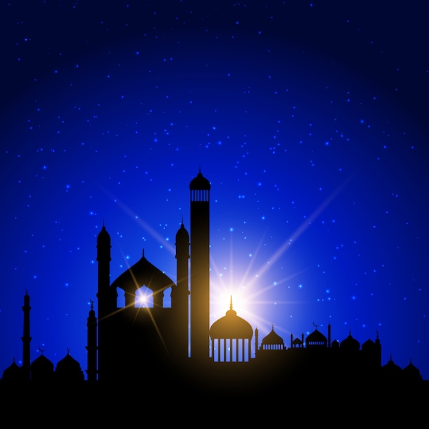 Silhouettes de la mosquée contre un ciel nocturne